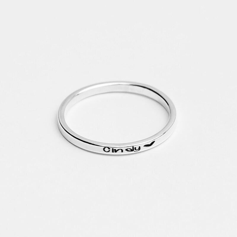 A minimalist 925 sterling silver ring engraved with the Vietnamese phrase "Cảm ơn" and a tiny heart symbol, this dainty band captures the essence of heartfelt gratitude and simplicity. With its clean, polished surface and understated charm, it’s perfect for everyday wear or gifting to someone special. Handcrafted with love and attention to detail, this fine silver ring celebrates personal messages and meaningful connections.