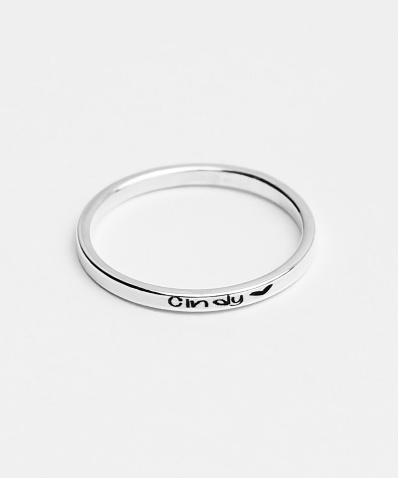 A minimalist 925 sterling silver ring engraved with the Vietnamese phrase 