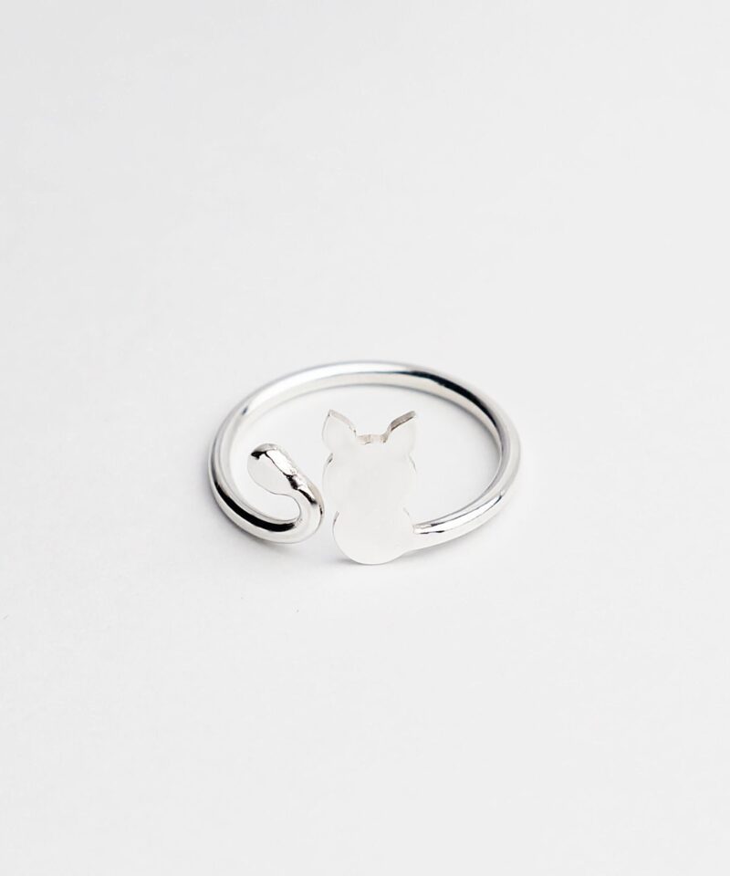 Adorable open band cat ring crafted from 925 sterling silver, showcasing a sleek cat outline with pointy ears and curled tail. The polished finish enhances its modern charm while celebrating feline grace. A lovely gift for pet lovers or anyone who treasures meaningful minimalist accessories.