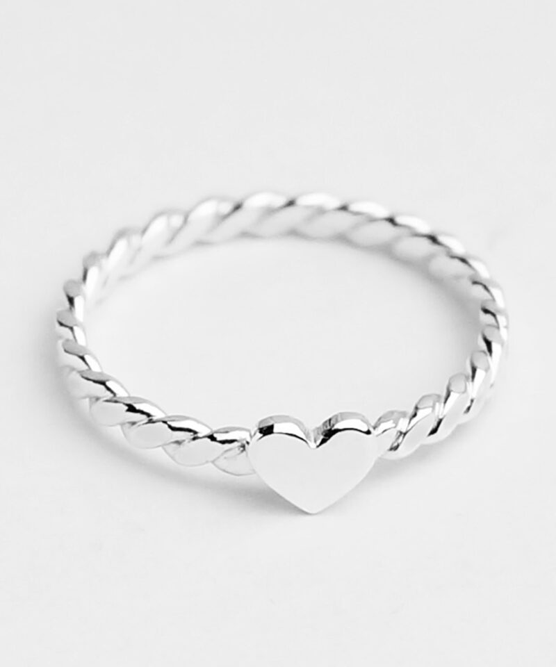 A dainty twisted band ring crafted from 925 sterling silver, featuring a polished heart centerpiece that adds a romantic charm. The delicate rope-style texture reflects soft light, highlighting its minimal yet eye-catching elegance. Perfect as a stacking ring or a sweet everyday reminder of love. This minimalist heart ring suits all styles and is ideal for gifting to someone special.