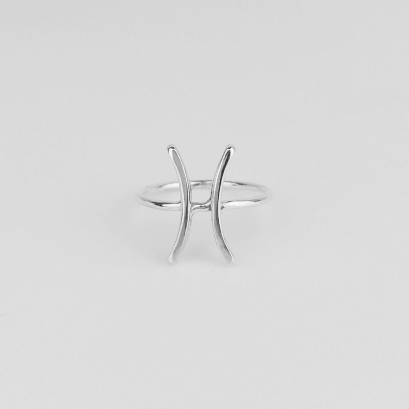 Minimalist Pisces zodiac ring handcrafted in 925 sterling silver, featuring the elegant astrological fish symbol formed by two curved lines crossing in the center. This lightweight, open-design ring is perfect for astrology lovers seeking a subtle yet meaningful jewelry piece representing intuition, emotion, and creativity.
