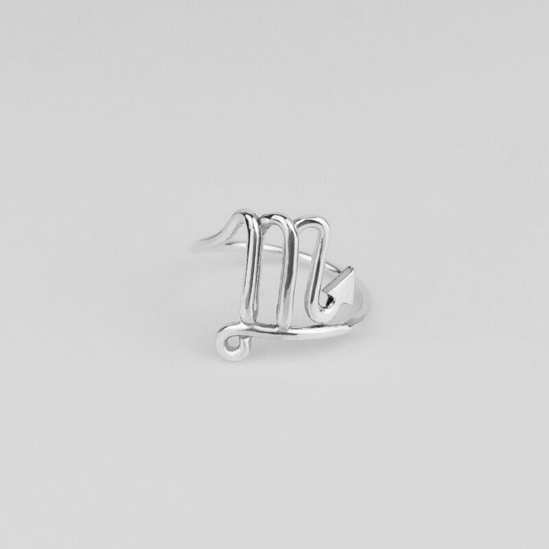 Minimalist Scorpio zodiac ring in polished 925 sterling silver, featuring a sleek wire-formed Scorpio symbol with a pointed tail design, captured on a white background to highlight its handcrafted details and astrological elegance.