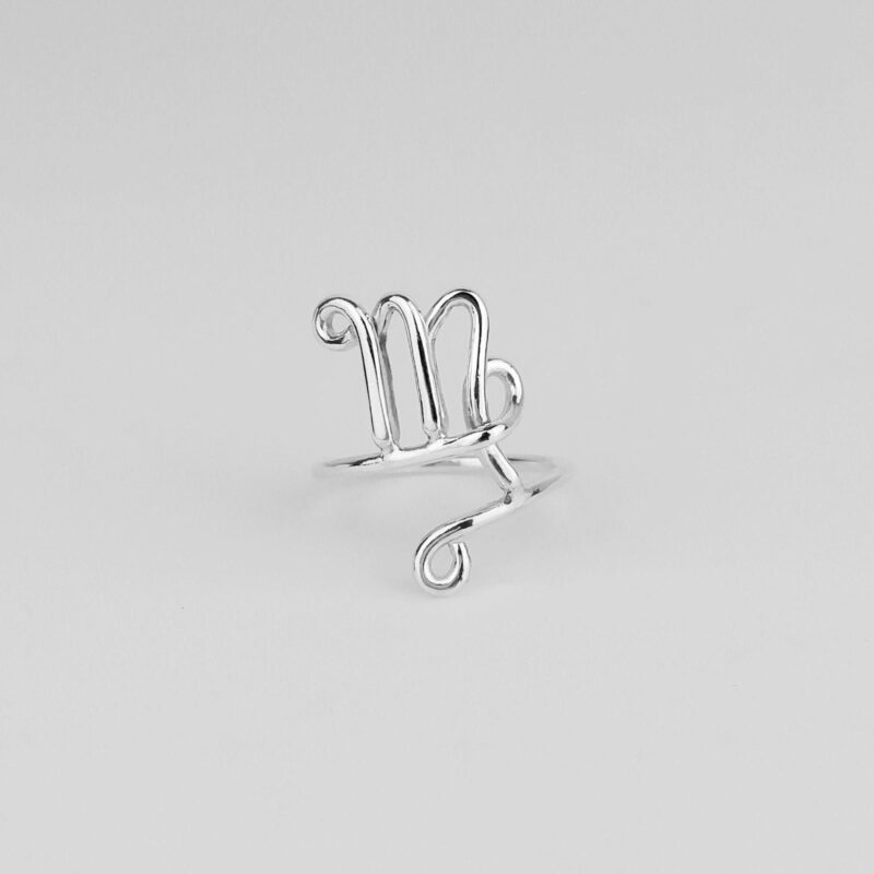 925 sterling silver Virgo ring with an open design and handcrafted wire detailing of the Virgo zodiac sign. The polished silver surface reflects light beautifully, showcasing the artistic interpretation of Virgo traits—analytical, kind, and graceful—in a minimalist jewelry form.