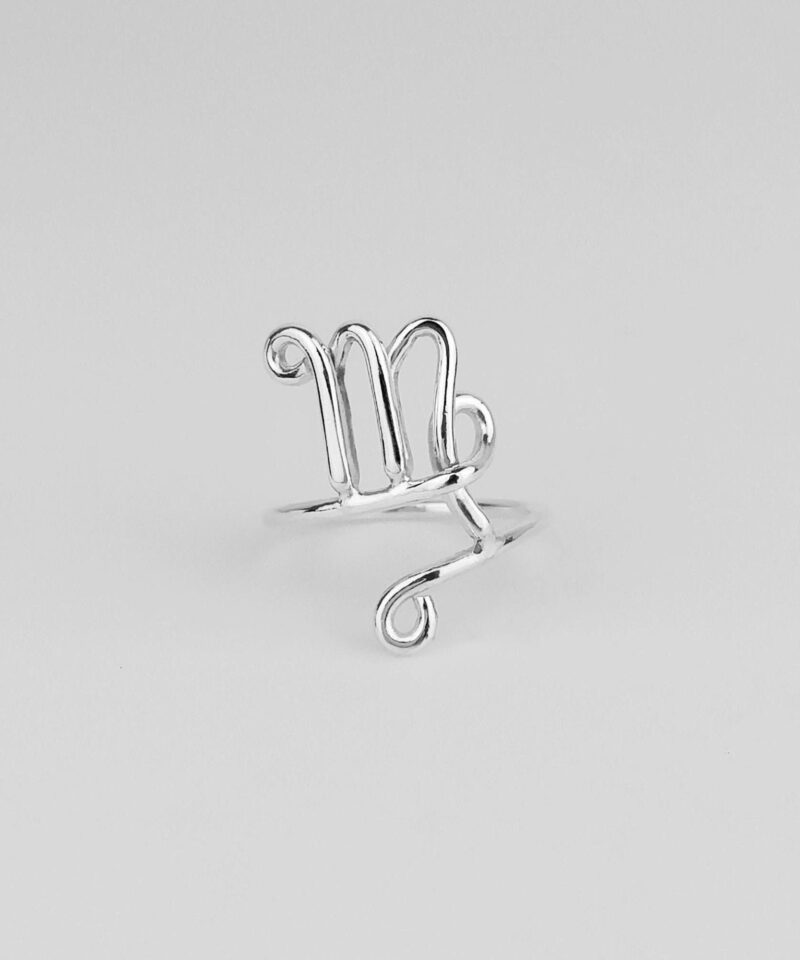 925 sterling silver Virgo ring with an open design and handcrafted wire detailing of the Virgo zodiac sign. The polished silver surface reflects light beautifully, showcasing the artistic interpretation of Virgo traits—analytical, kind, and graceful—in a minimalist jewelry form.