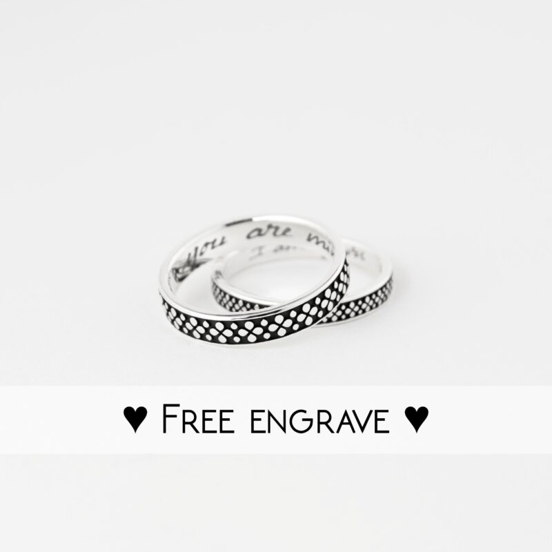 A clean product shot of the two rings side-by-side on white background, emphasizing the symmetry and detail in the Japanese flower pattern. Crafted from solid 925 sterling silver, these rings are hypoallergenic, durable, and customizable with free engraving.