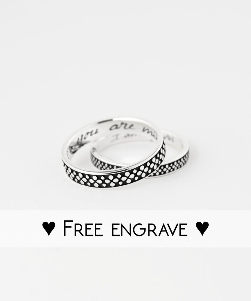 A clean product shot of the two rings side-by-side on white background, emphasizing the symmetry and detail in the Japanese flower pattern. Crafted from solid 925 sterling silver, these rings are hypoallergenic, durable, and customizable with free engraving.